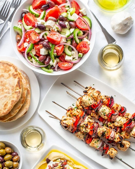 chicken kabobs with greek cumber tomato salad